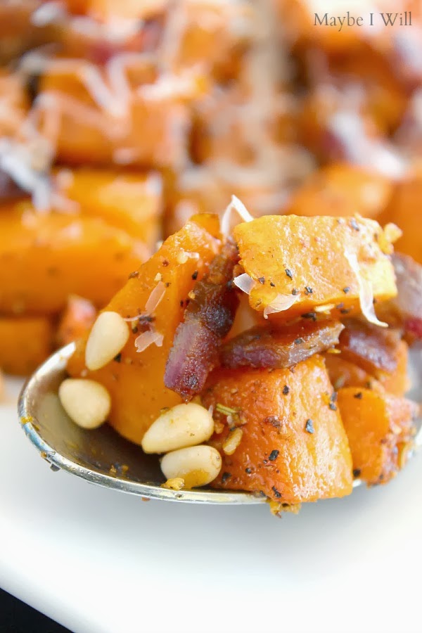 The tastiest looking bite of roasted butternut squash, bacon, pinenuts, and parmesan cheese