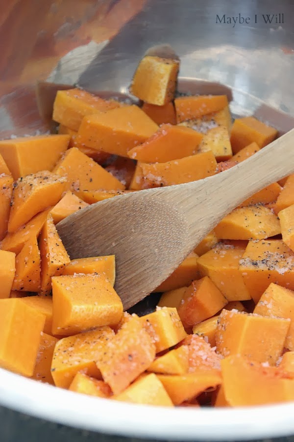 mix chopped butternut squash with salt, pepper, and butter flavored olive oil.