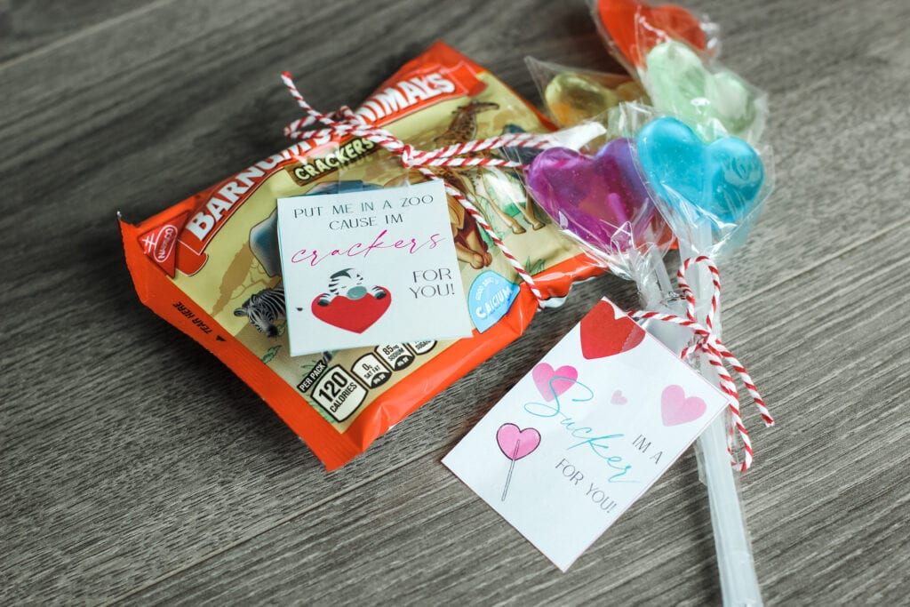 Photo of valentine's gifts for day one and day two animal crackers and suckers. 