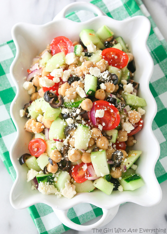 Photo of Greek Garbanzo Bean Salad looks so refreshing served in a white bowl 
