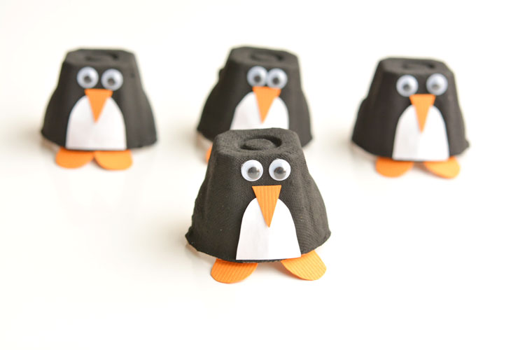 photo of penguins made out of upcycled materials. 