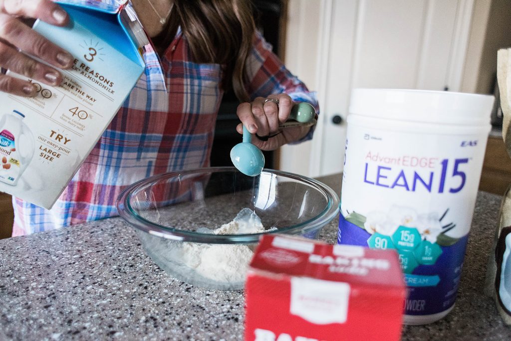 Andie mixing ingredients together to make the protein skillet cookie