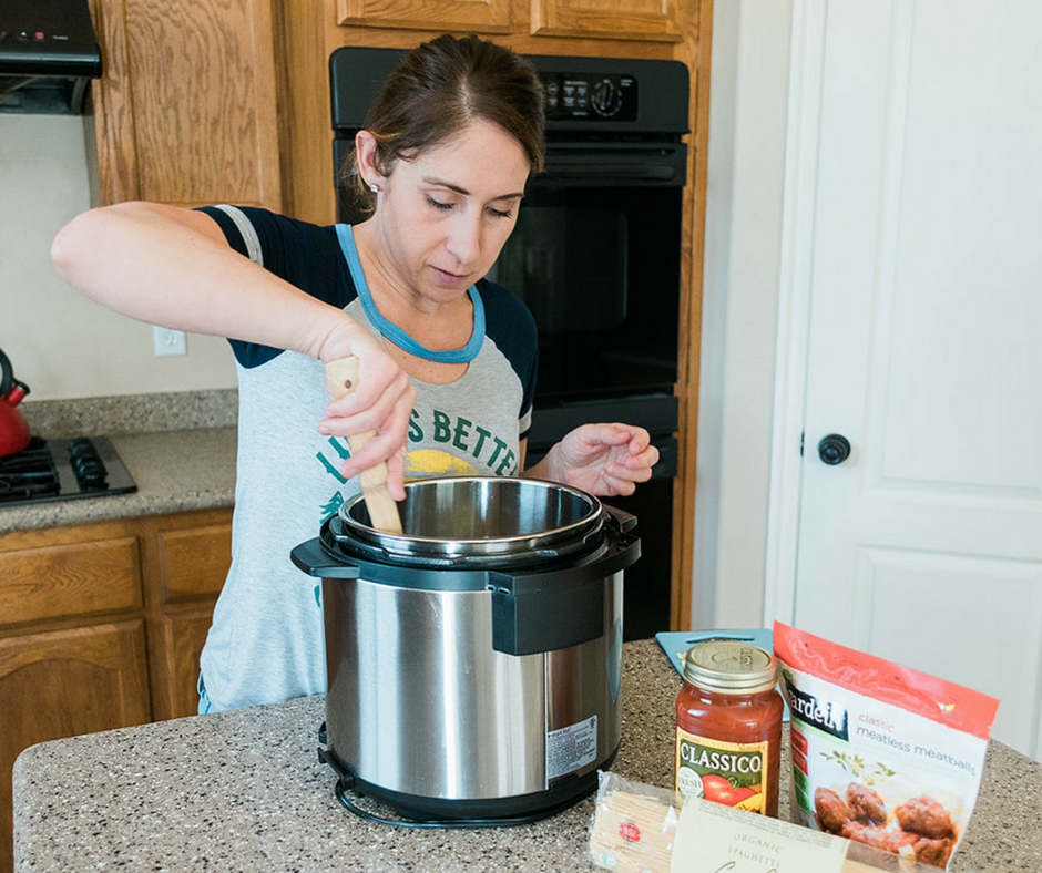 For those nights when you need dinner on the table fast this Easy Instant Pot Vegetarian Spaghetti and Meatballs is about the easiest throw together dinner there is! 