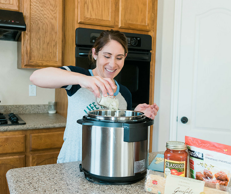 For those nights when you need dinner on the table fast this Easy Instant Pot Vegetarian Spaghetti and Meatballs is about the easiest throw together dinner there is! 