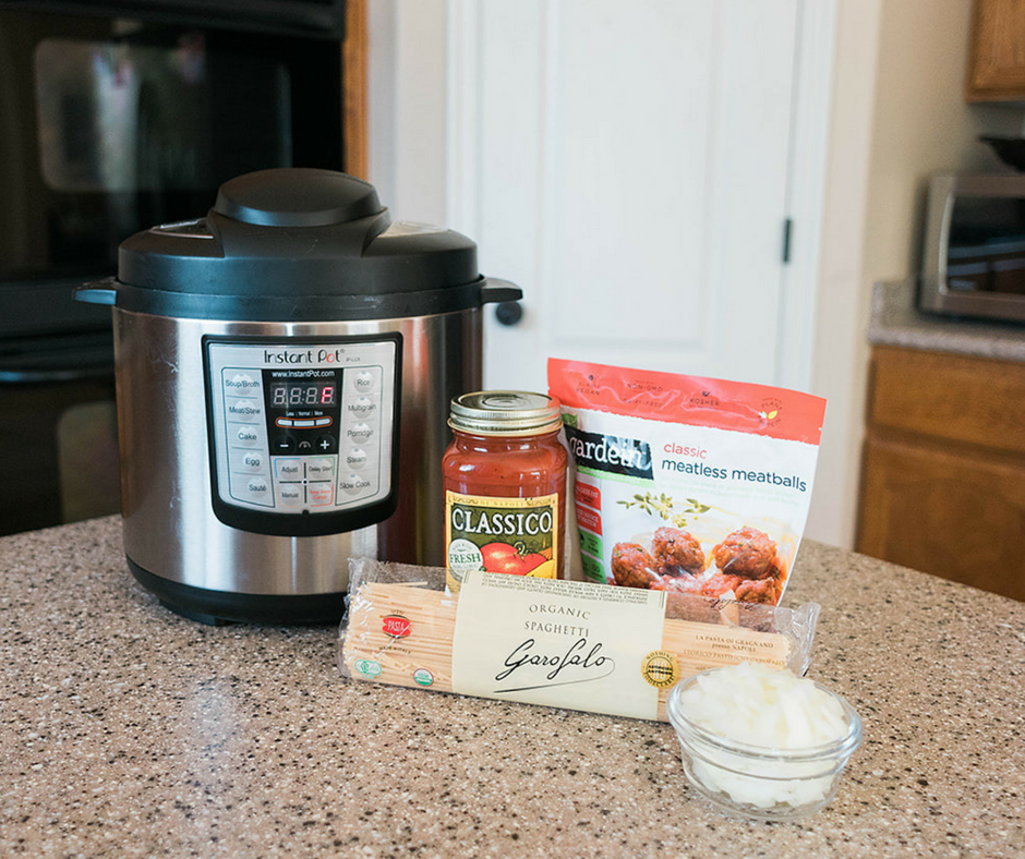 For those nights when you need dinner on the table fast this Easy Instant Pot Vegetarian Spaghetti and Meatballs is about the easiest throw together dinner there is! 