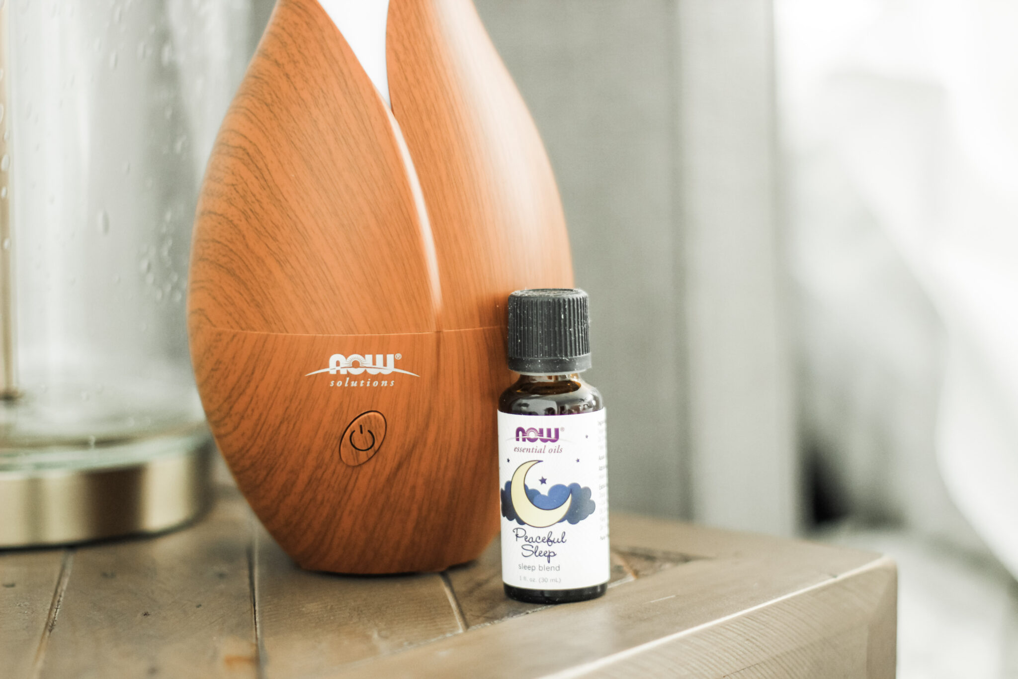 Image of essential oils that help with sleep, and relaxation. Combine essential oils with sleep affirmations for a better night's sleep.