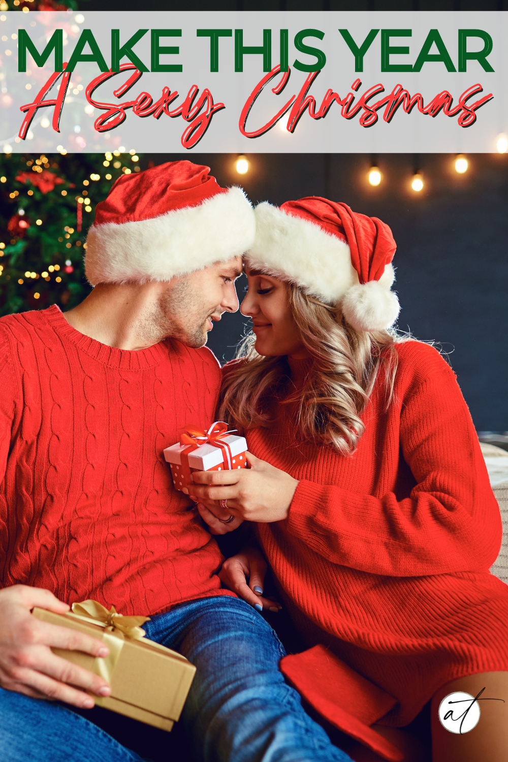 Couple snuggled up exchanging gifts. There is a Christmas tree in the background. They are making the most out of their sexy Christmas.  