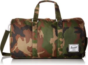 Green, tan, and brown Herschel brand camo design duffel/ gym bag. 