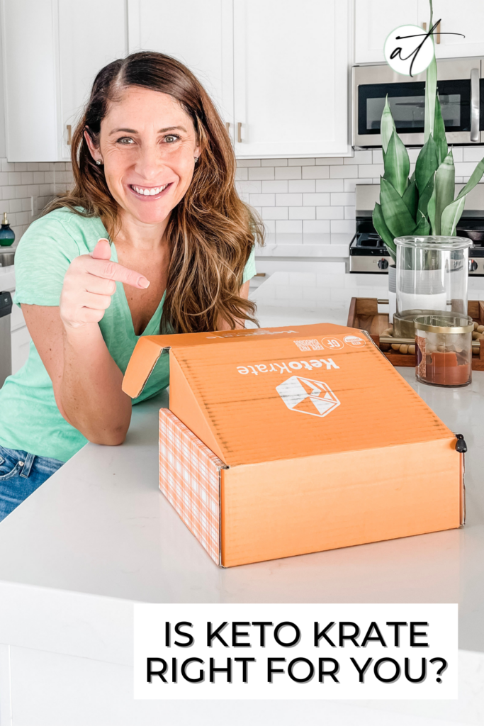 Photo of Andie unboxing a Keto Krate monthly subscription box. Each box is filled with Keto friendly snacks and goodies. 