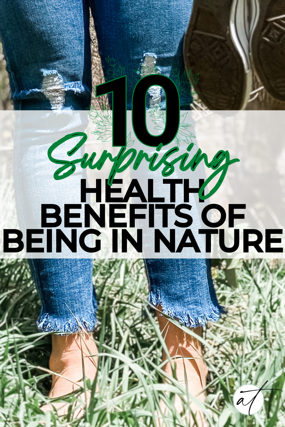 Andie standing in grass shoes in hand fully immersed and enjoying the health benefits of  nature. 