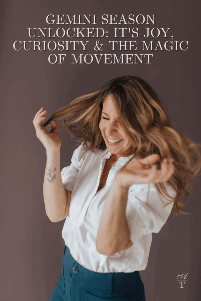Photo of Andie smiling and being silly. With the wording "Gemini Season Unlocked: It's Joy, Curiosity & the Magic of Movement" written in bold lettering at the top of the photo. 