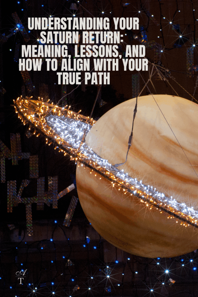 Fun image of Saturn with twinkle lights, looks like a school project build of crafty saturn. The words "Understanding Your Saturn Return: Meaning, Lessons, and How to Align with Your True Path" are transposed on top of the image. 